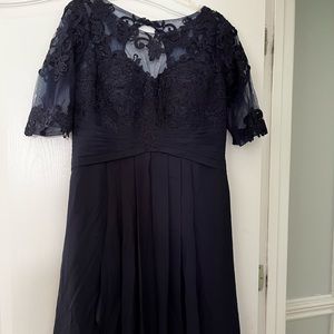 Brand new never worn. Beautiful dress that laces up the back.